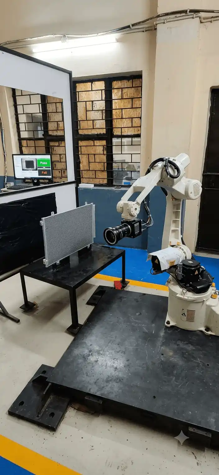 Engineer calibrating a FANUC robot